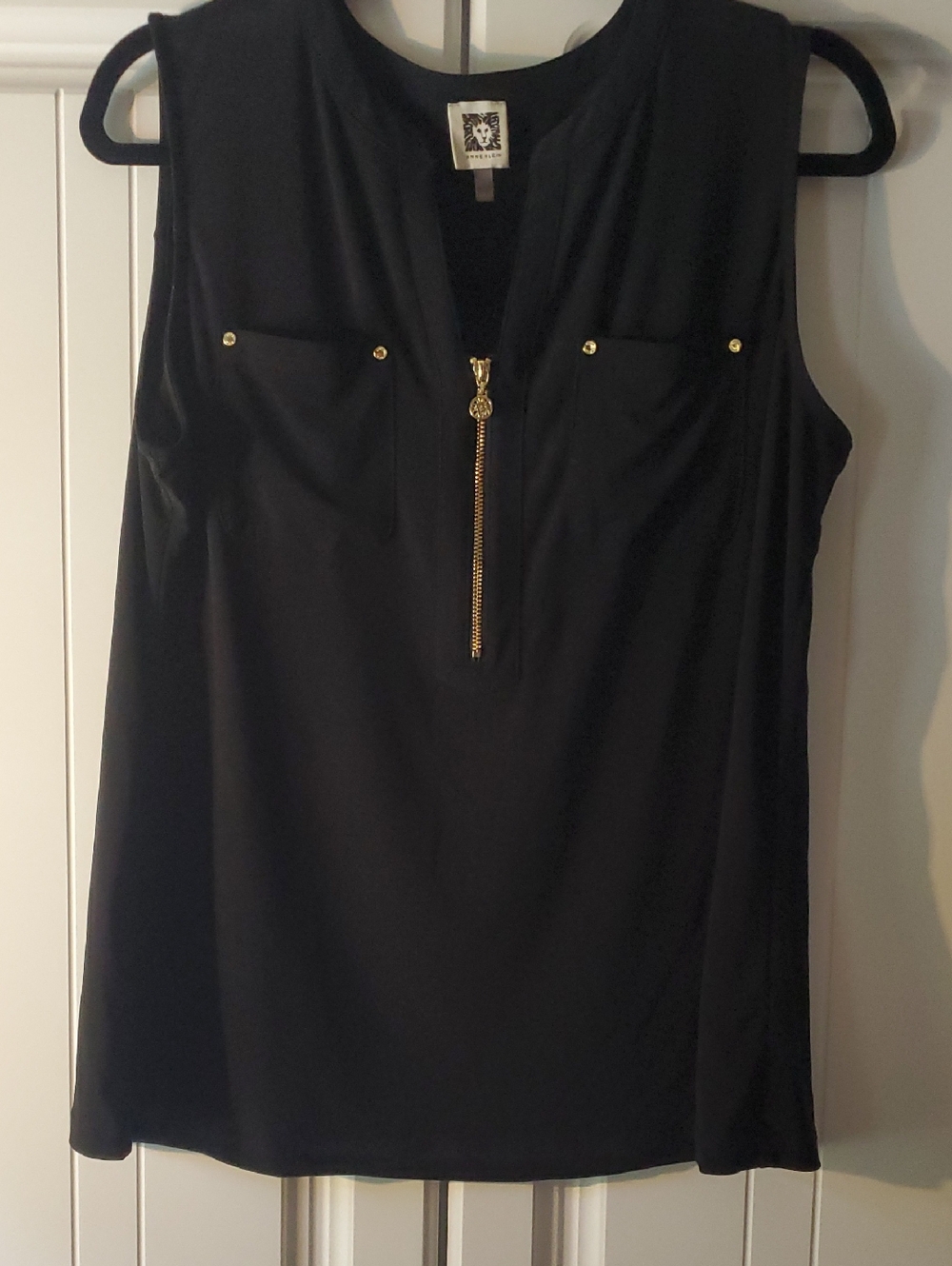 Anne Klein Black Garment with White Lion Logo Tag